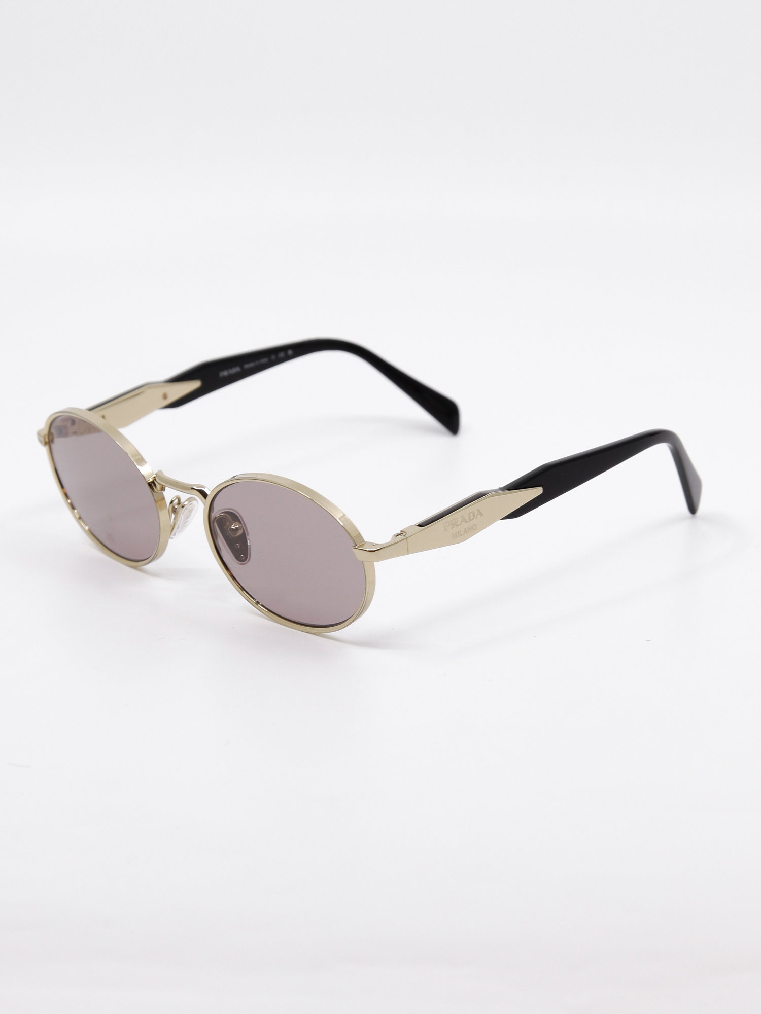 Oval metallsolbrille i gull med rosa glass