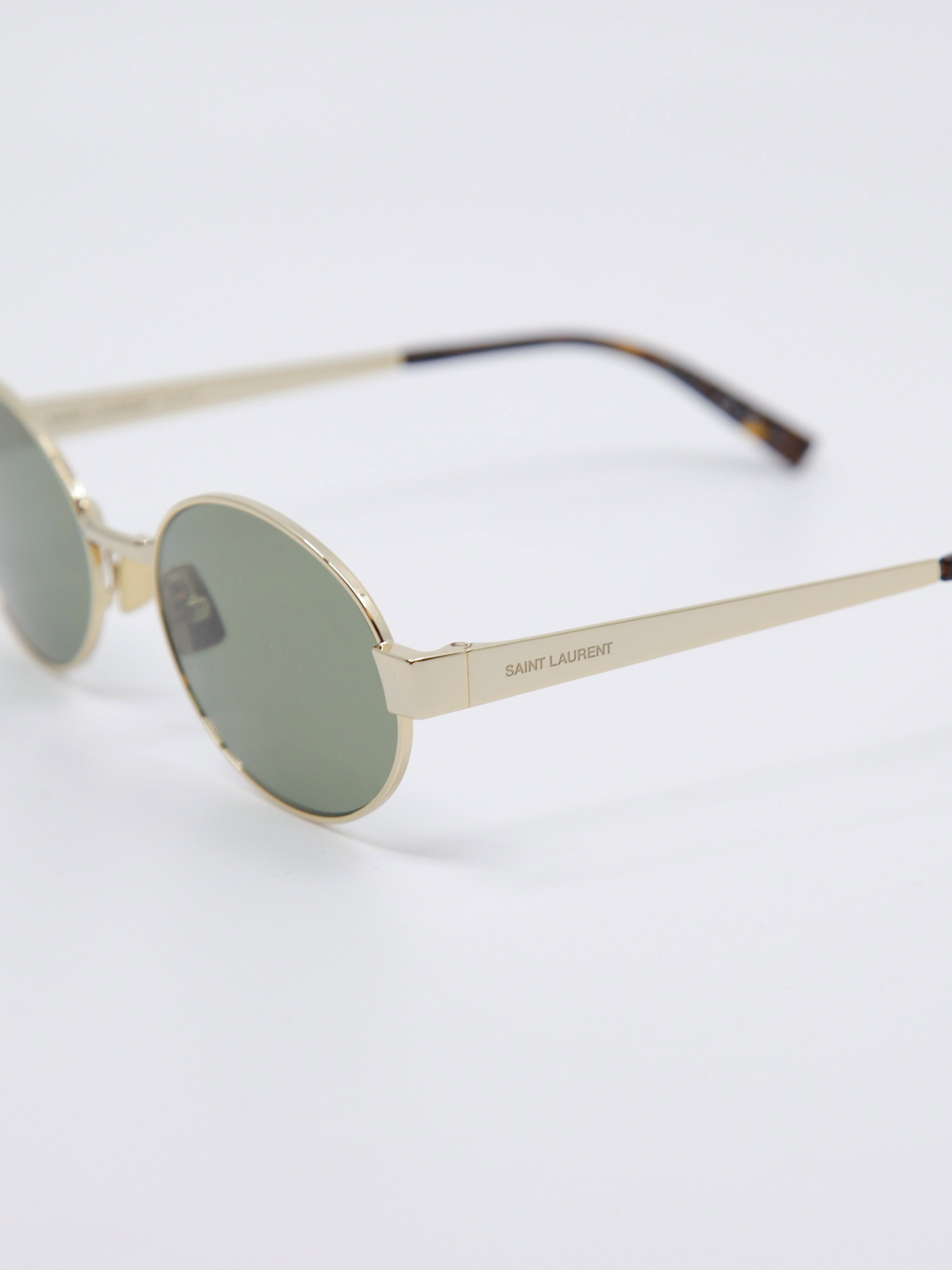 Oval metallsolbrille i gull