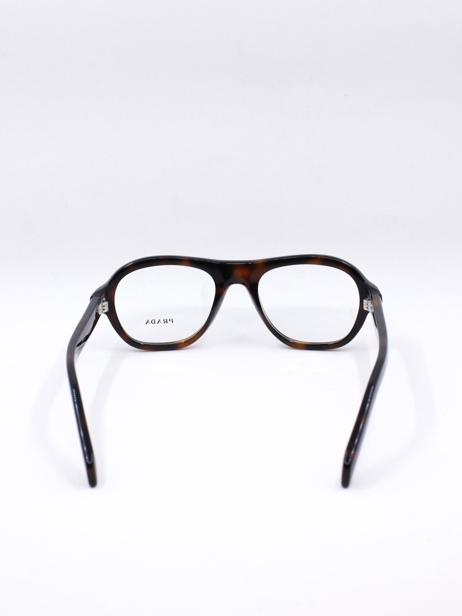 Pilotbrille med rund shape og brun ramme