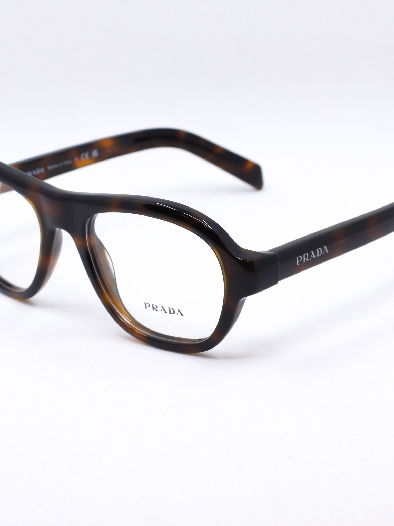 Pilotbrille med rund shape og brun ramme