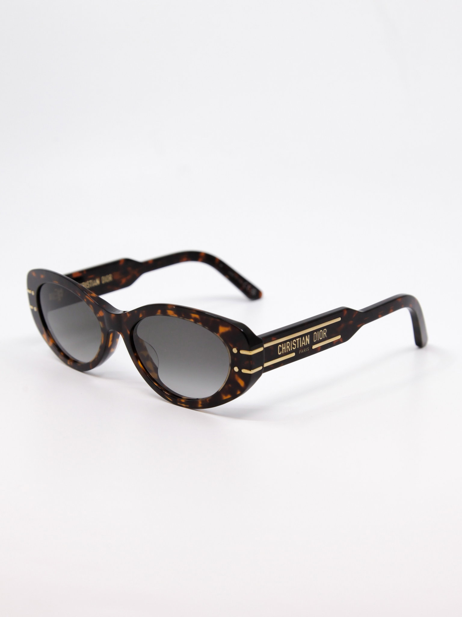 Solbrille med avrundet cateye fasong