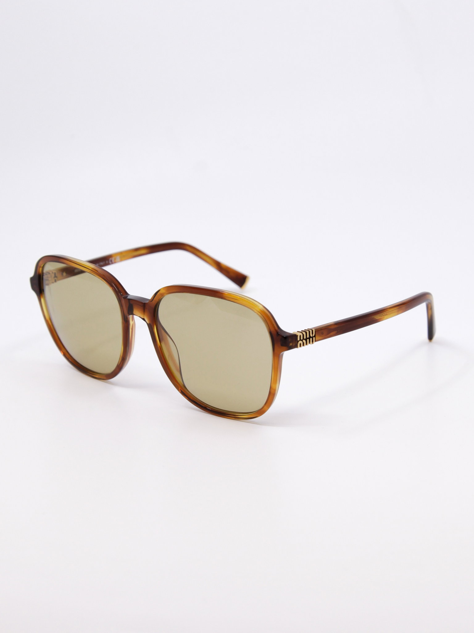 Brun solbrille med 70-talls vibber, gule store solbrilleglass