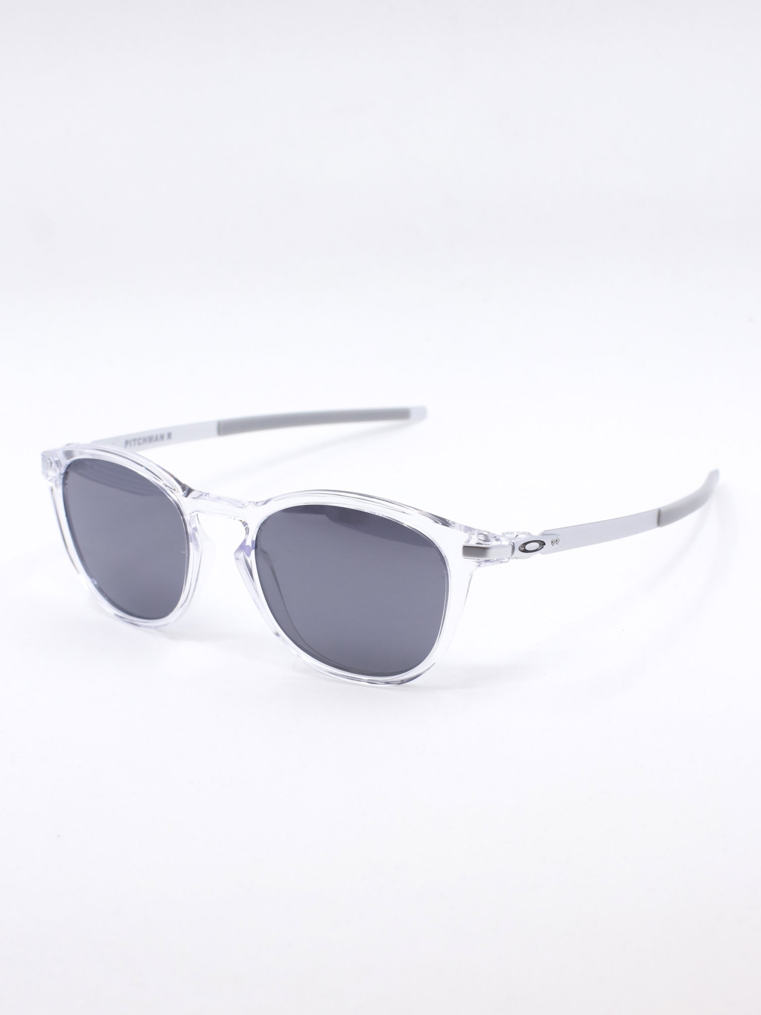 Rund solbrille med transparent ramme og grå glass