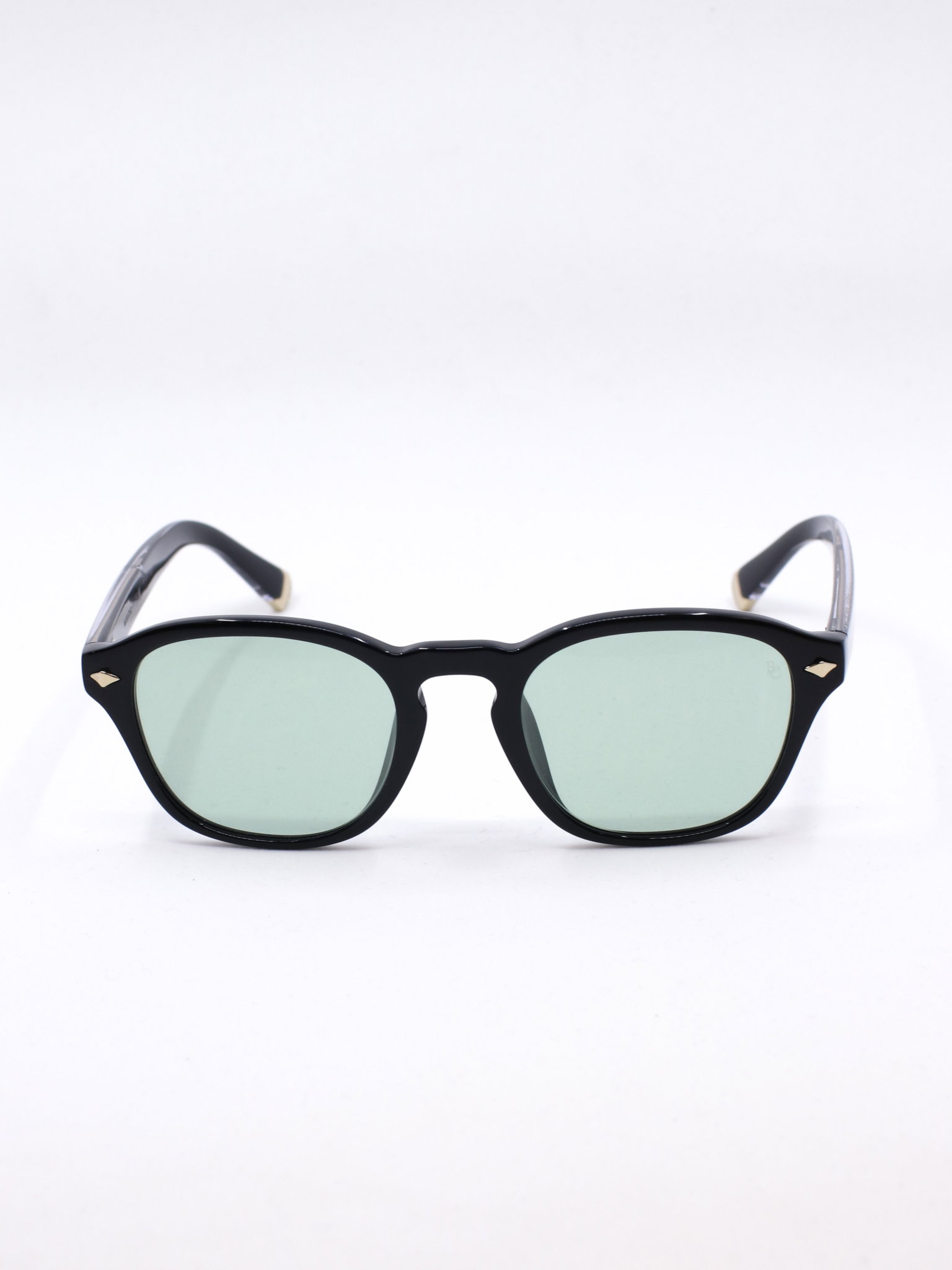 Svart solbrille med grønne glass