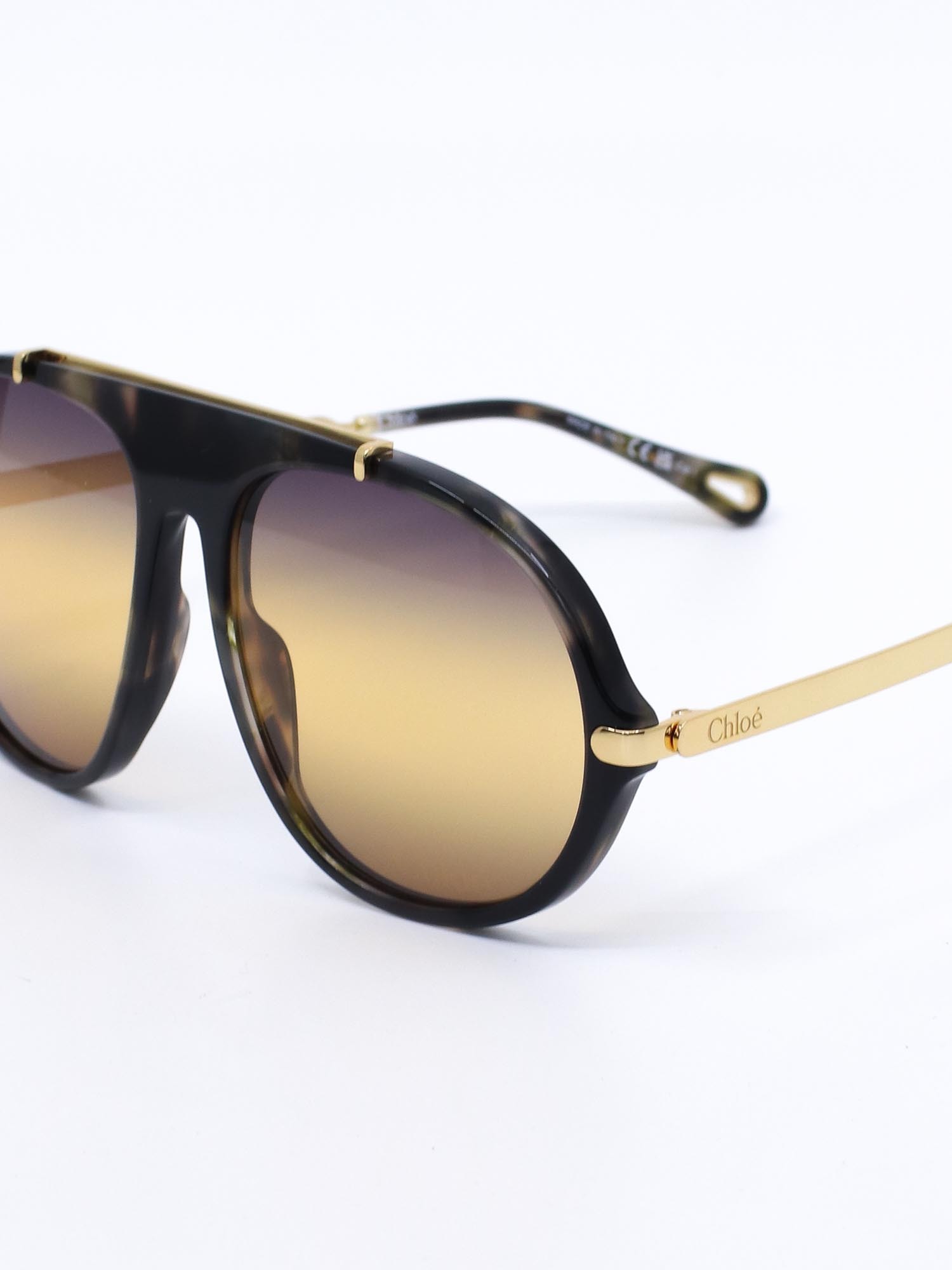 Pilotsolbrille med oversized passform og store, gule glass