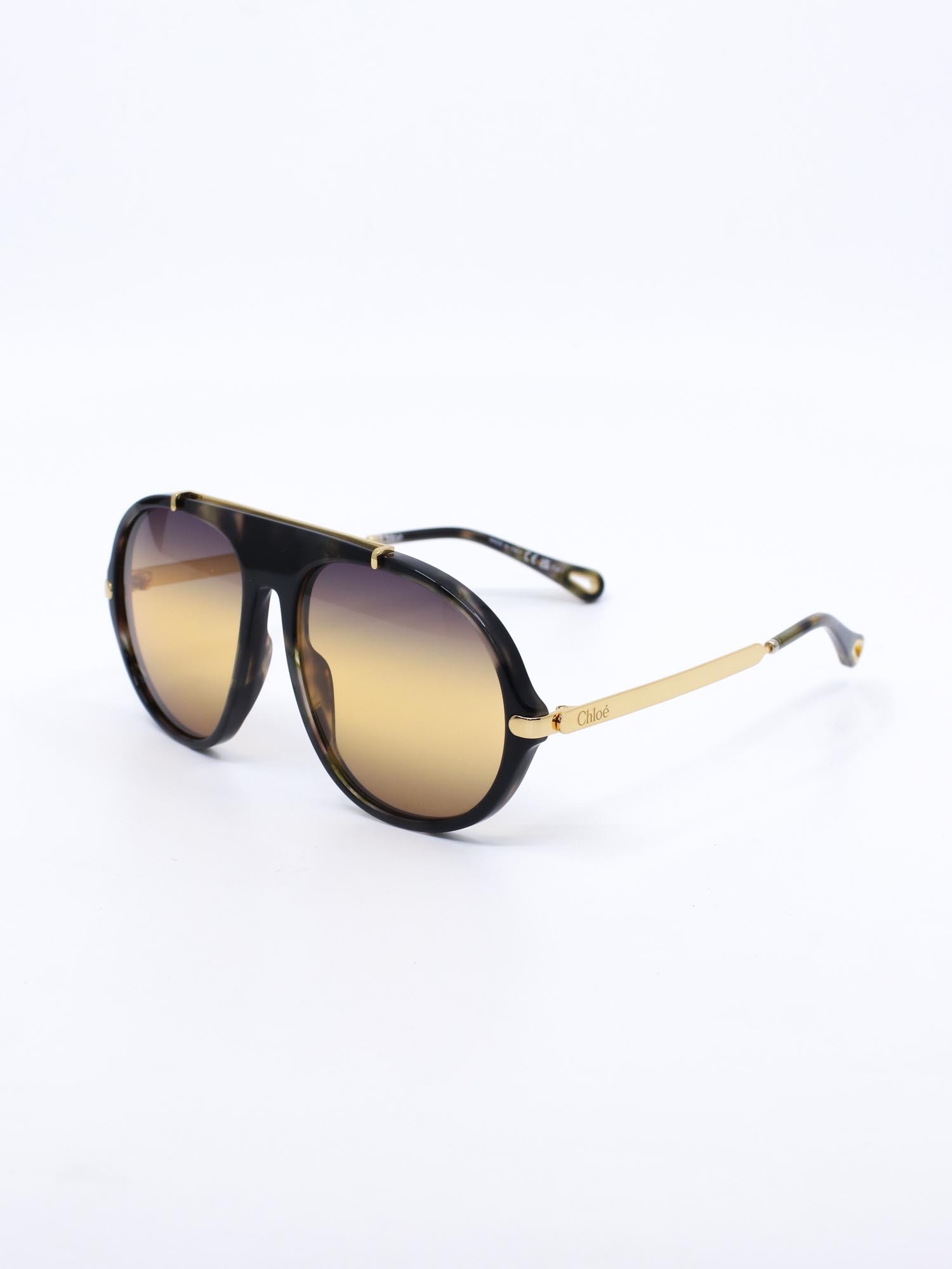 Pilotsolbrille med oversized passform og store, gule glass