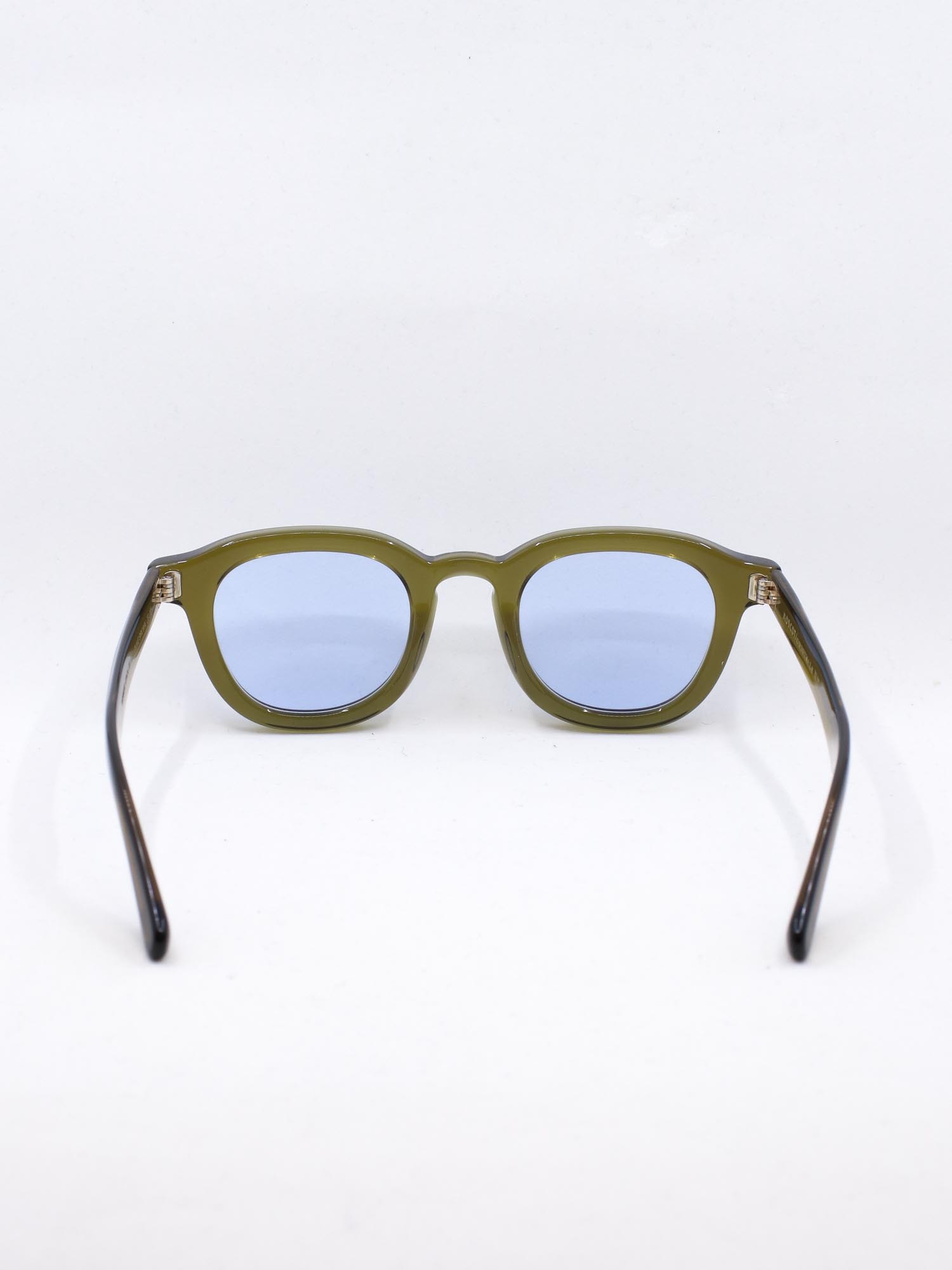 Grønn solbrille med lys blå glass