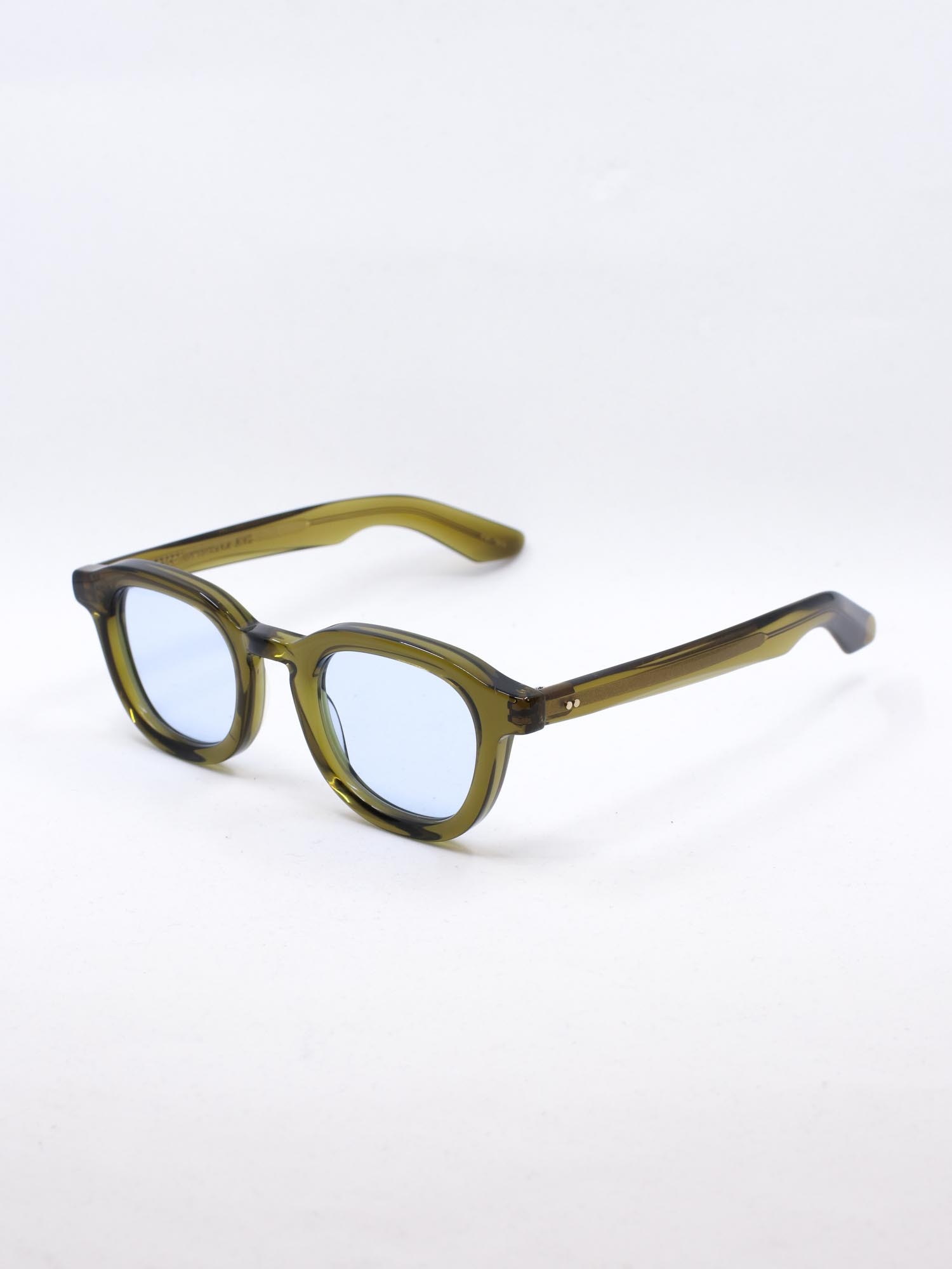 Grønn solbrille med lys blå glass