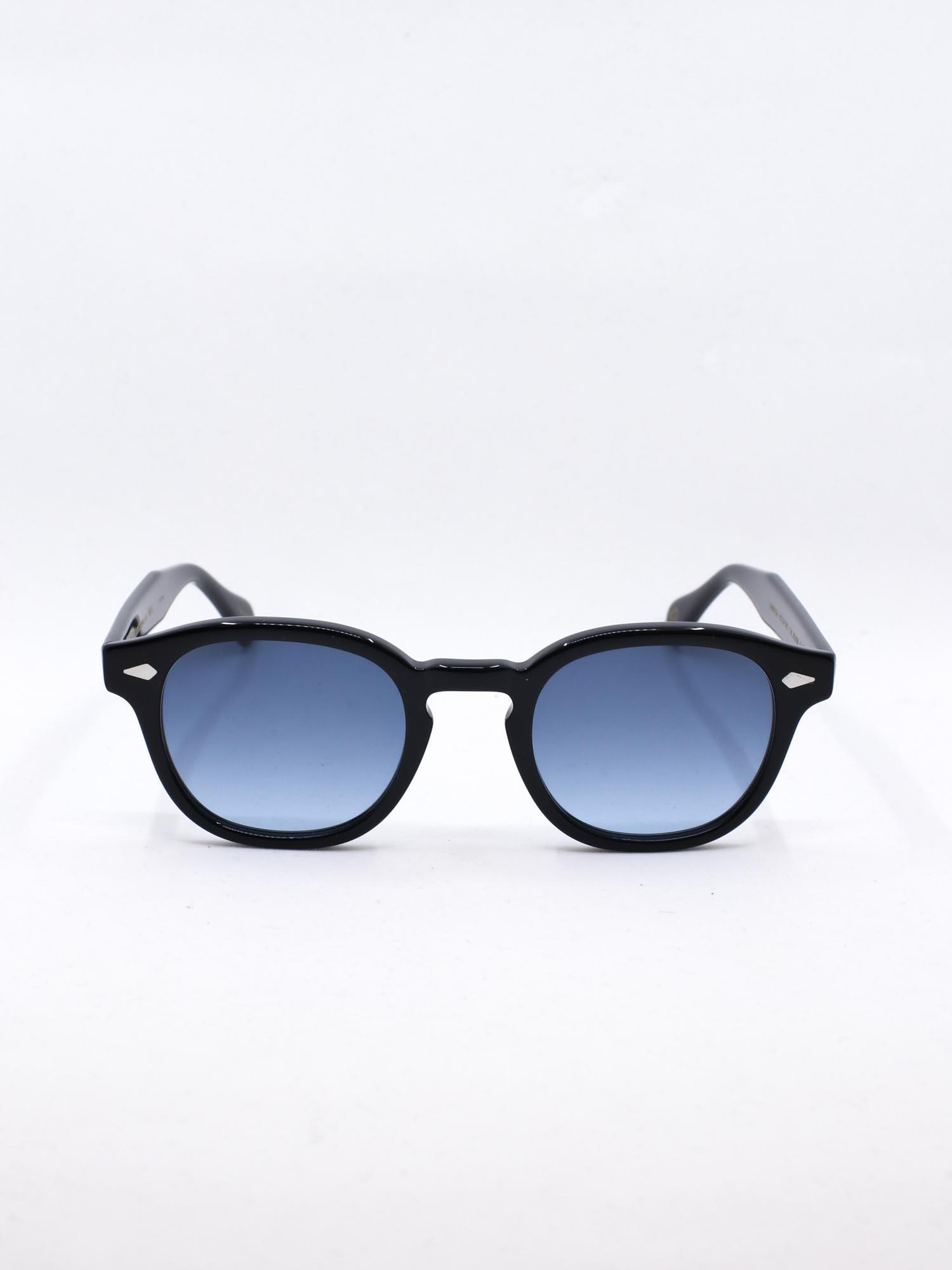 Svart solbrille med blå glass