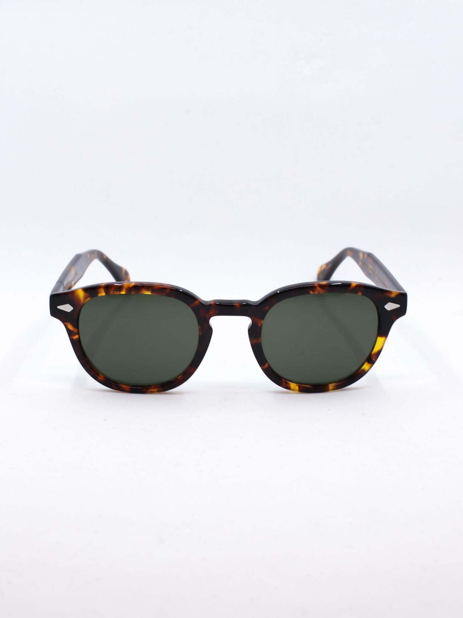 Solbrille i brun farge