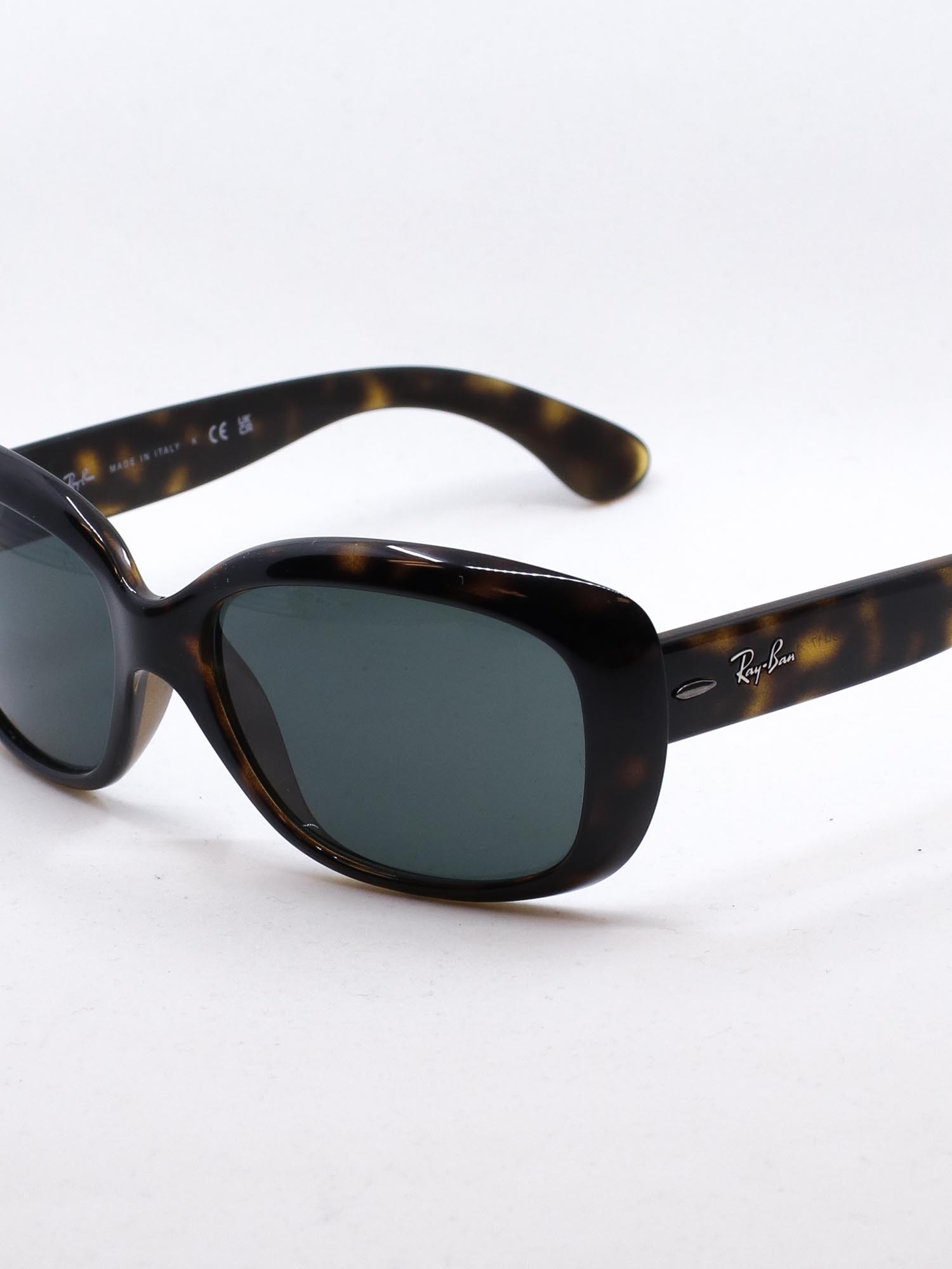 Solbrille i brun farge