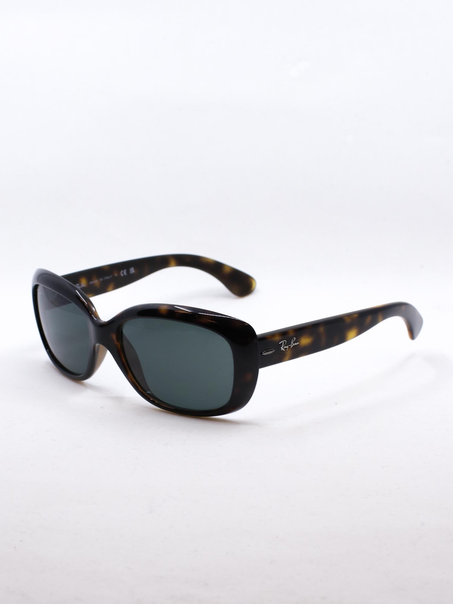 Solbrille i brun farge