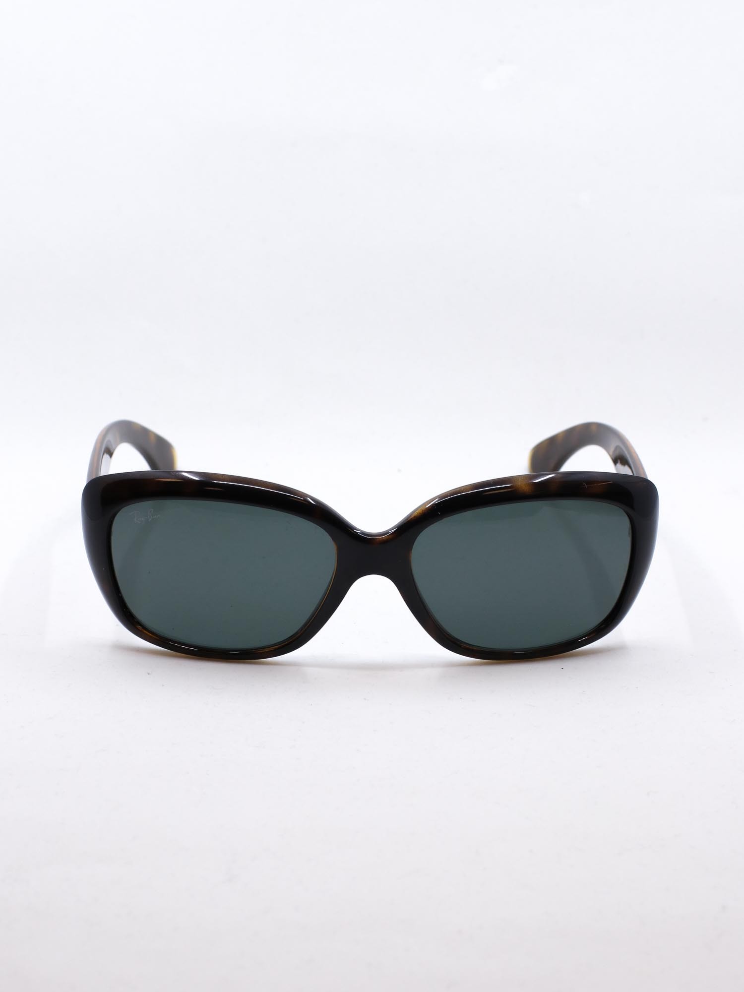 Solbrille i brun farge