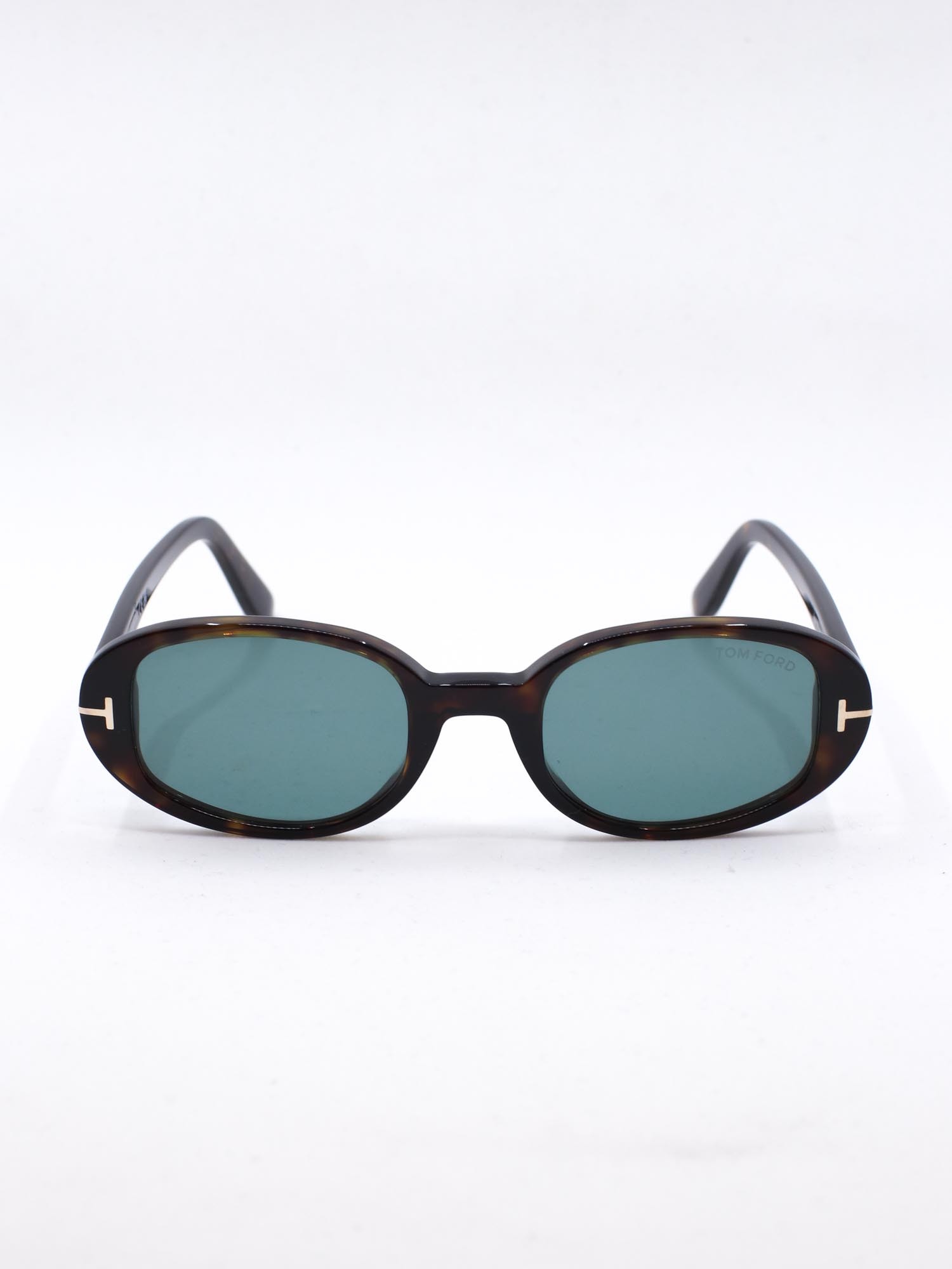 Oval solbrille med brun ramme og blå glass