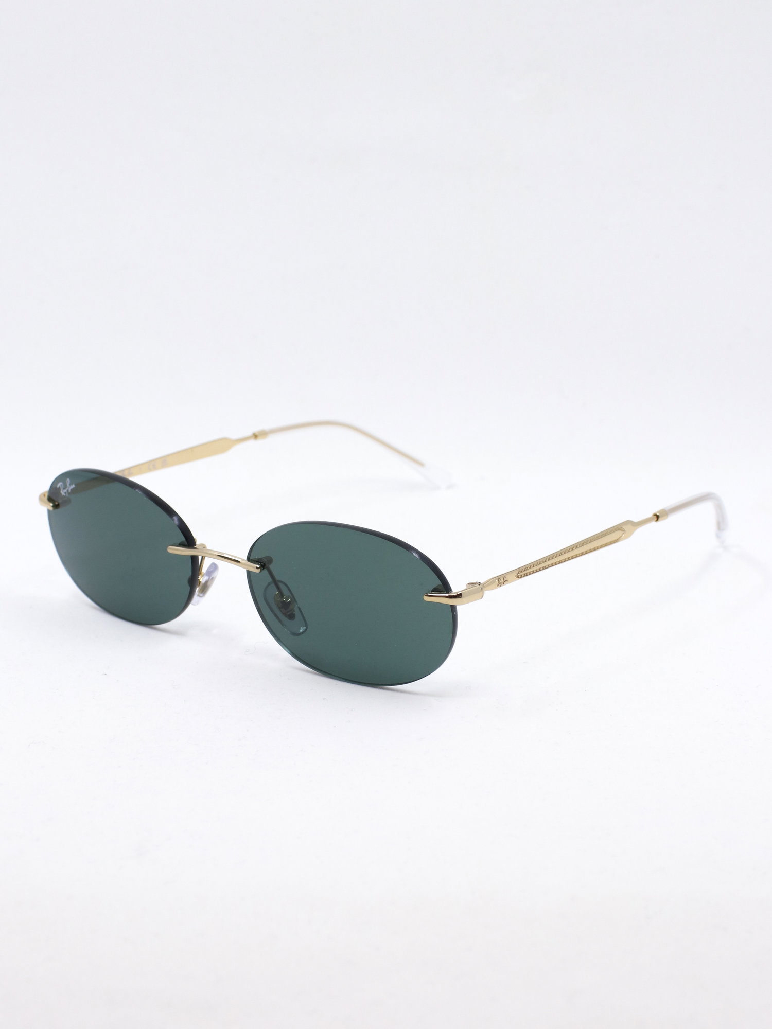 Oval rammeløs solbrille med metallstenger