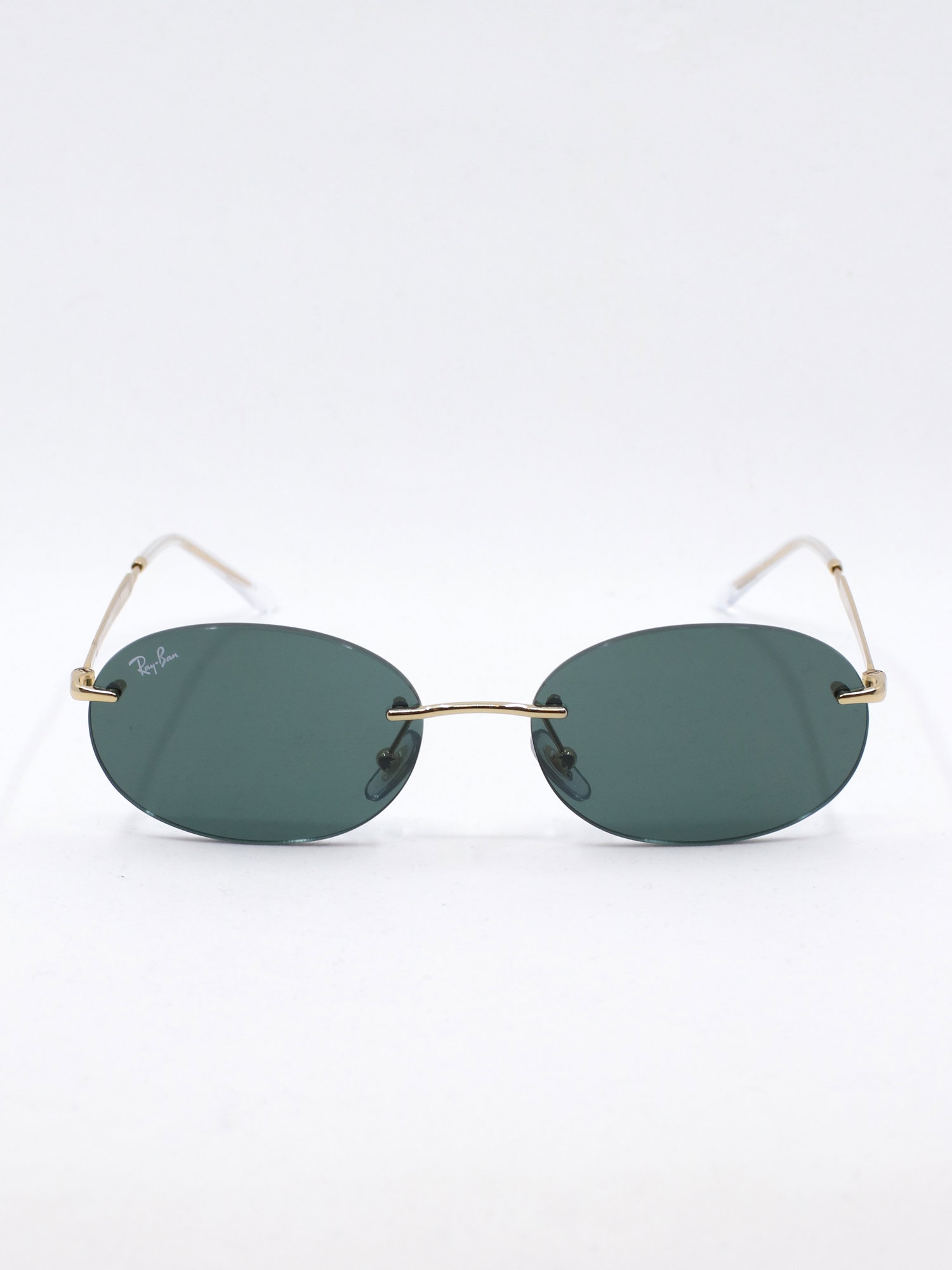 Oval rammeløs solbrille med metallstenger
