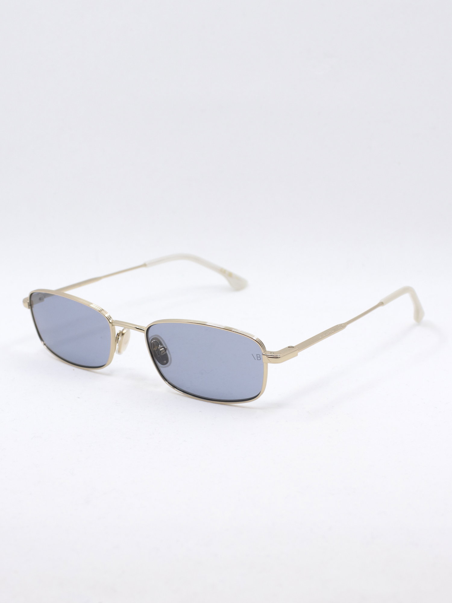 Smal metallsolbrille med blå glass