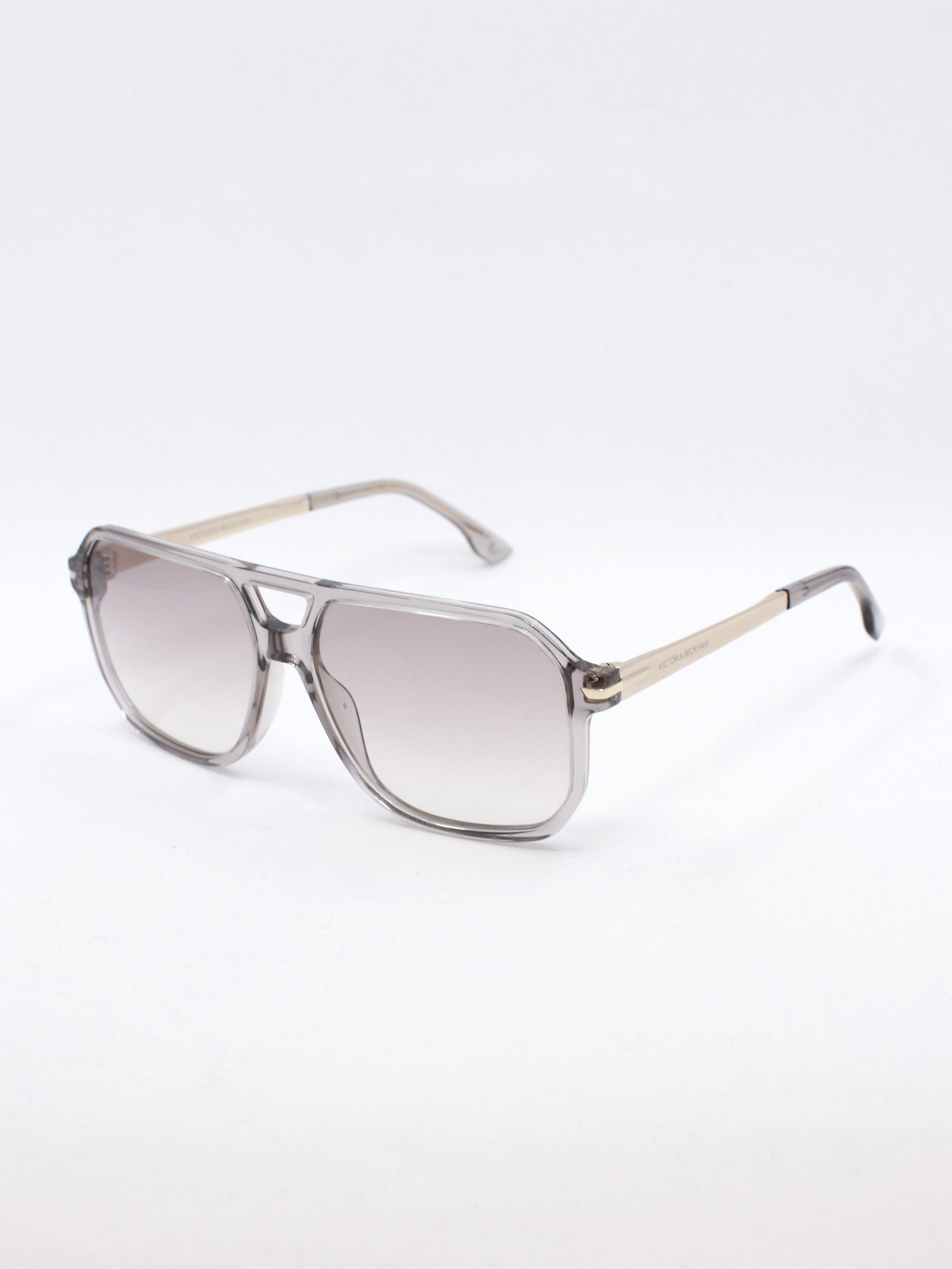 Pilotsolbrille med beige ramme og lyse glass