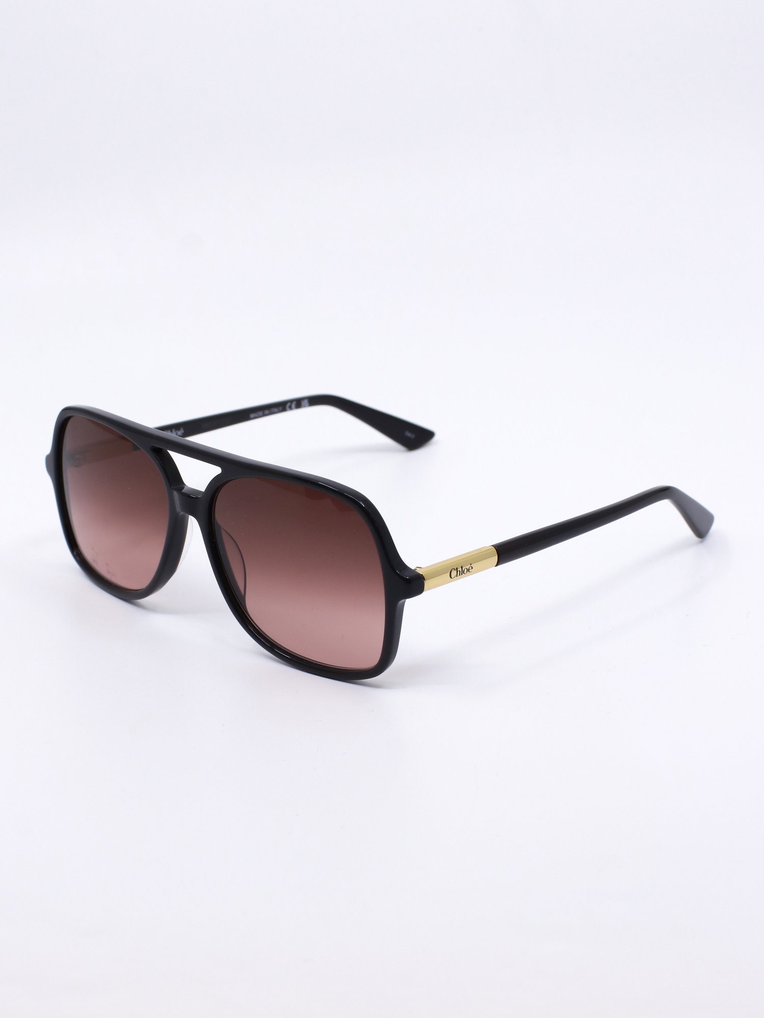Pilotsolbrille med svart ramme og rød-rosa graderte solbrilleglass