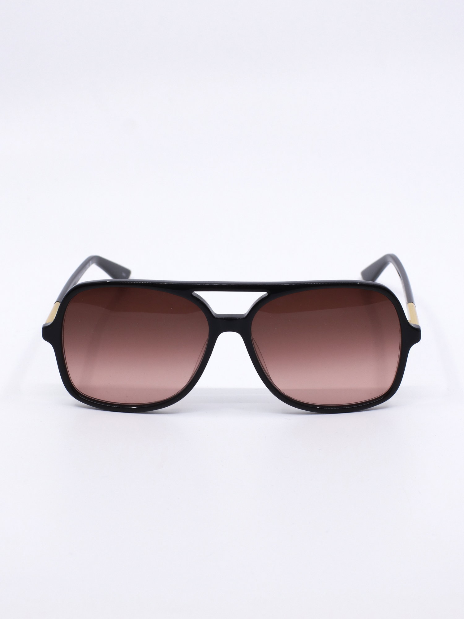 Pilotsolbrille med svart ramme og rød-rosa graderte solbrilleglass