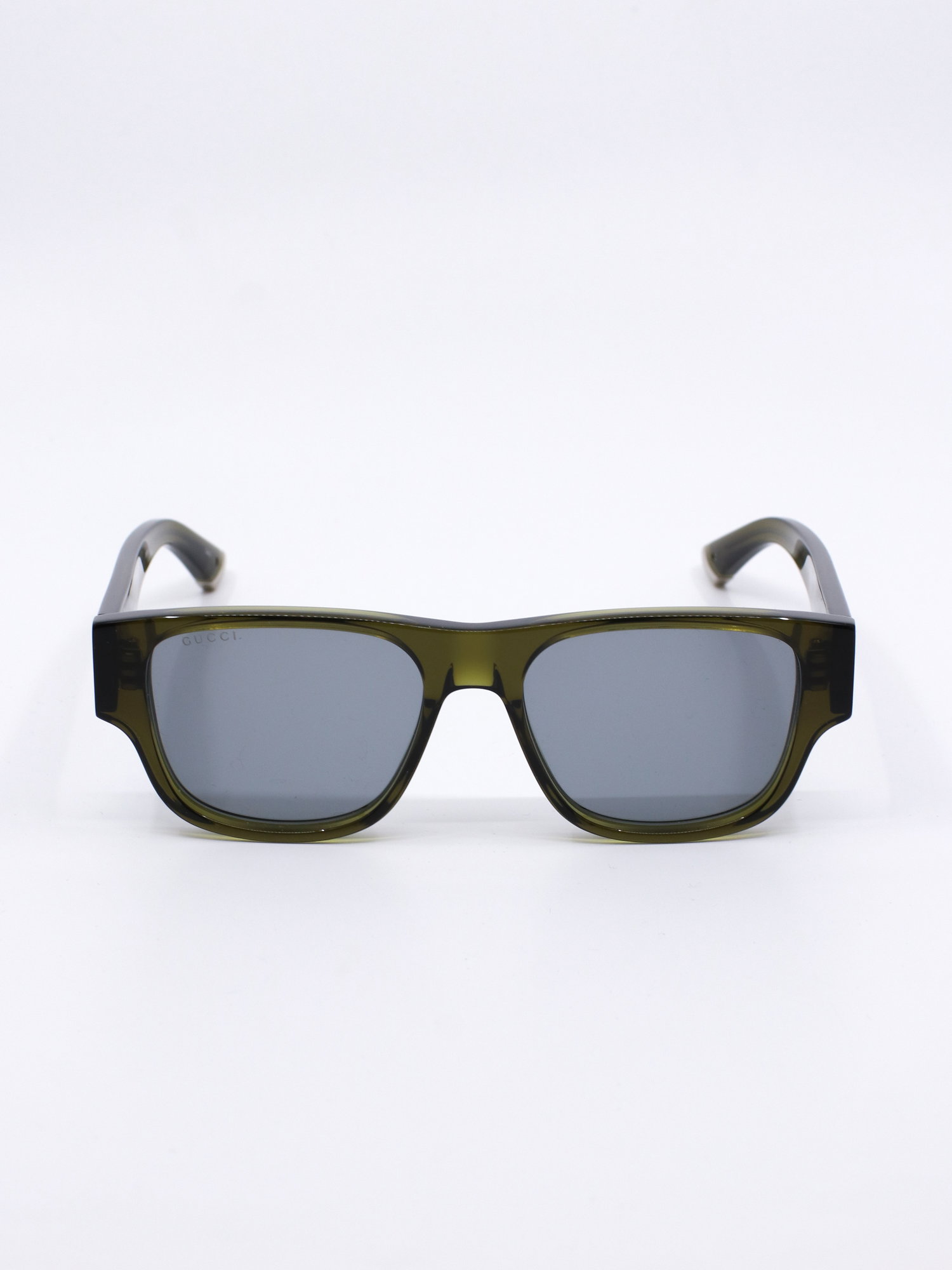 Grønn solbrille med rektangulær fasong