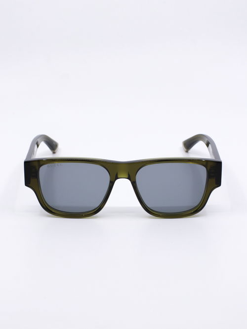 Grønn solbrille med rektangulær fasong