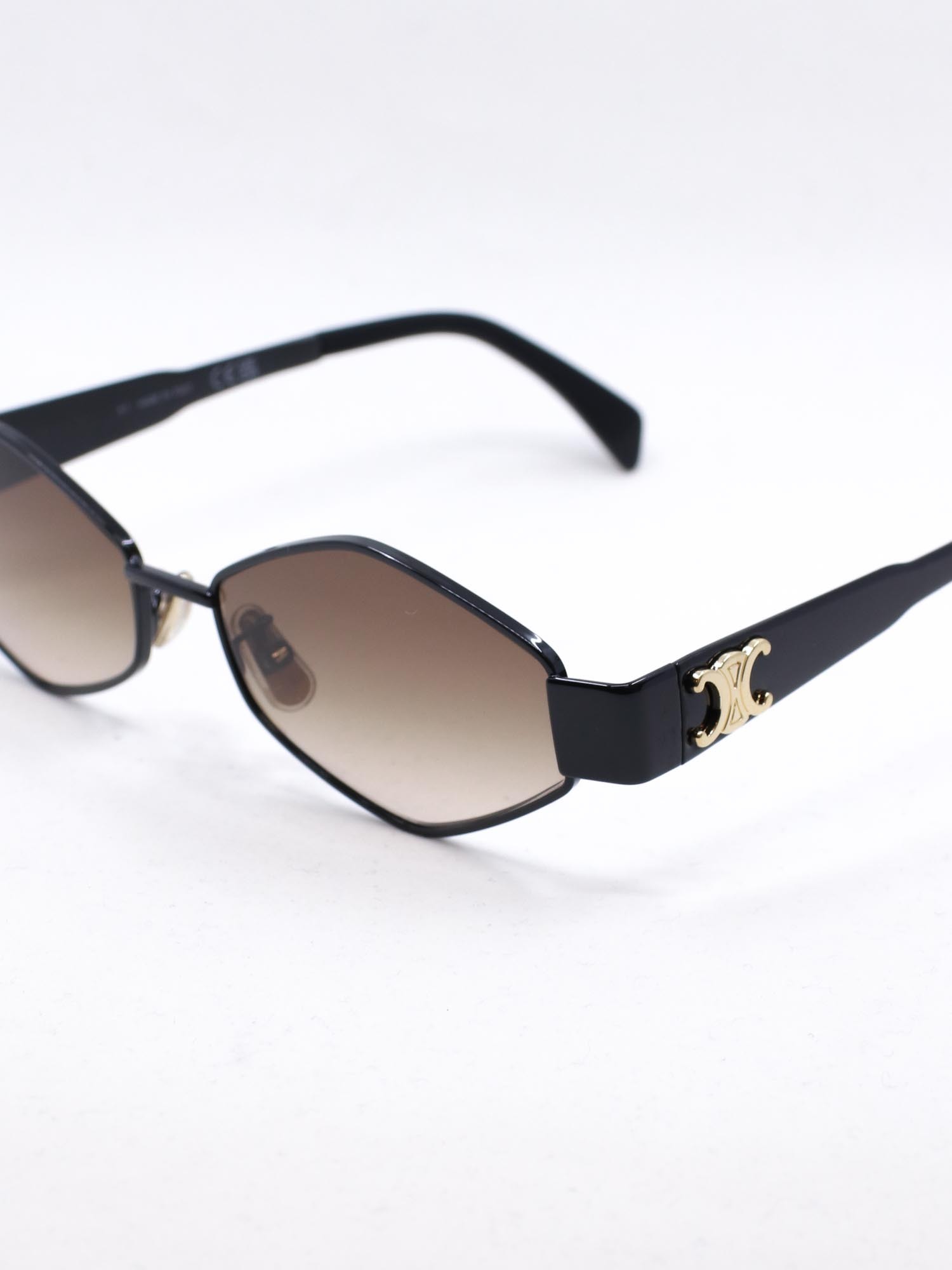 Metallsolbrille med brune glass