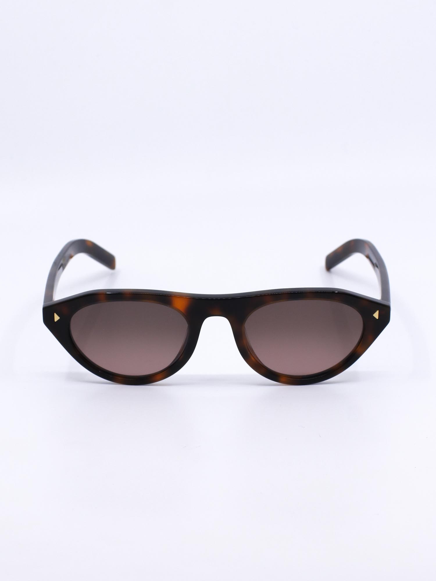Stilig brun solbrille med brune graderte solbrilleglass med hint av lilla