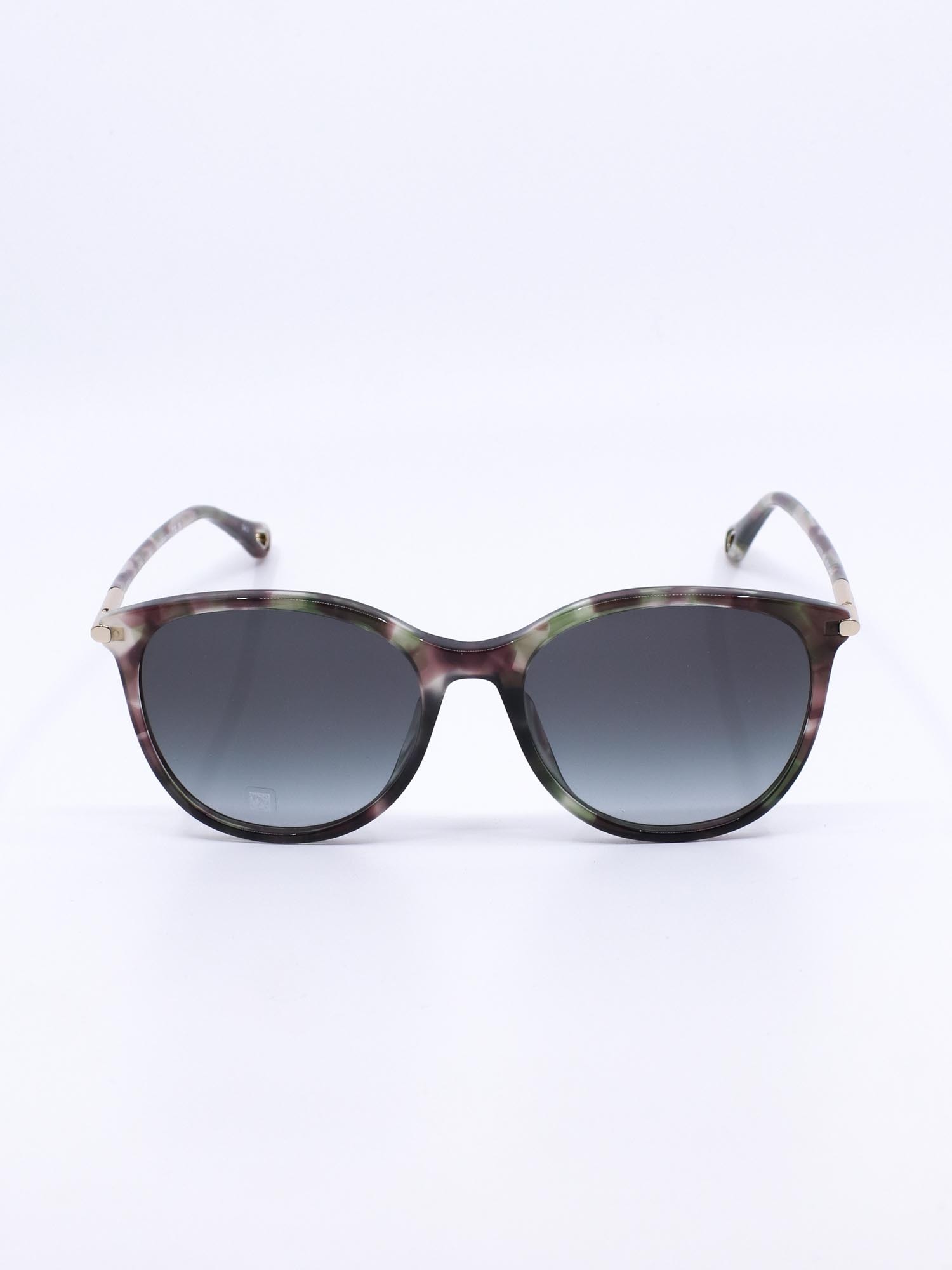 Solbrille med myk avrundet fasong og en ramme med fargespill