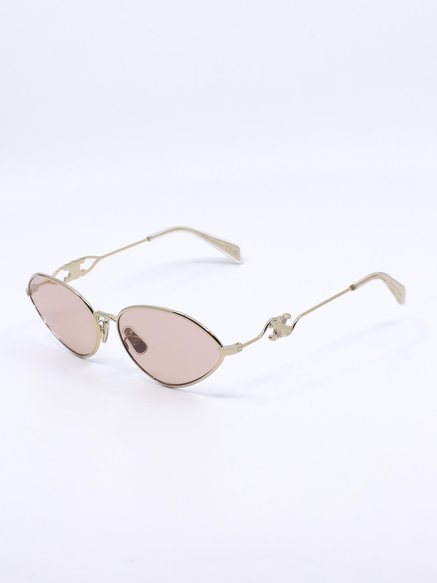 Metallsolbrille i gull med rosa glass og cateye fasong