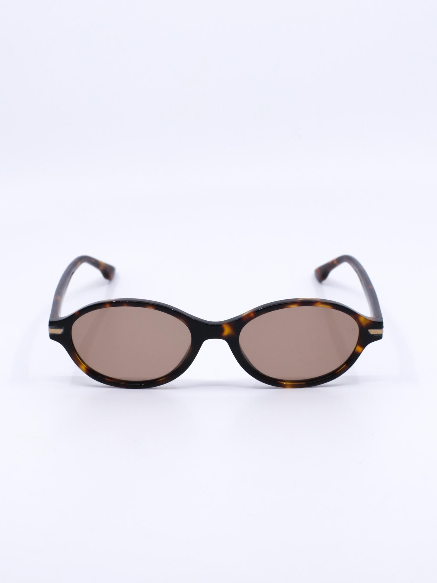 Oval solbrille med brun ramme og brune glass