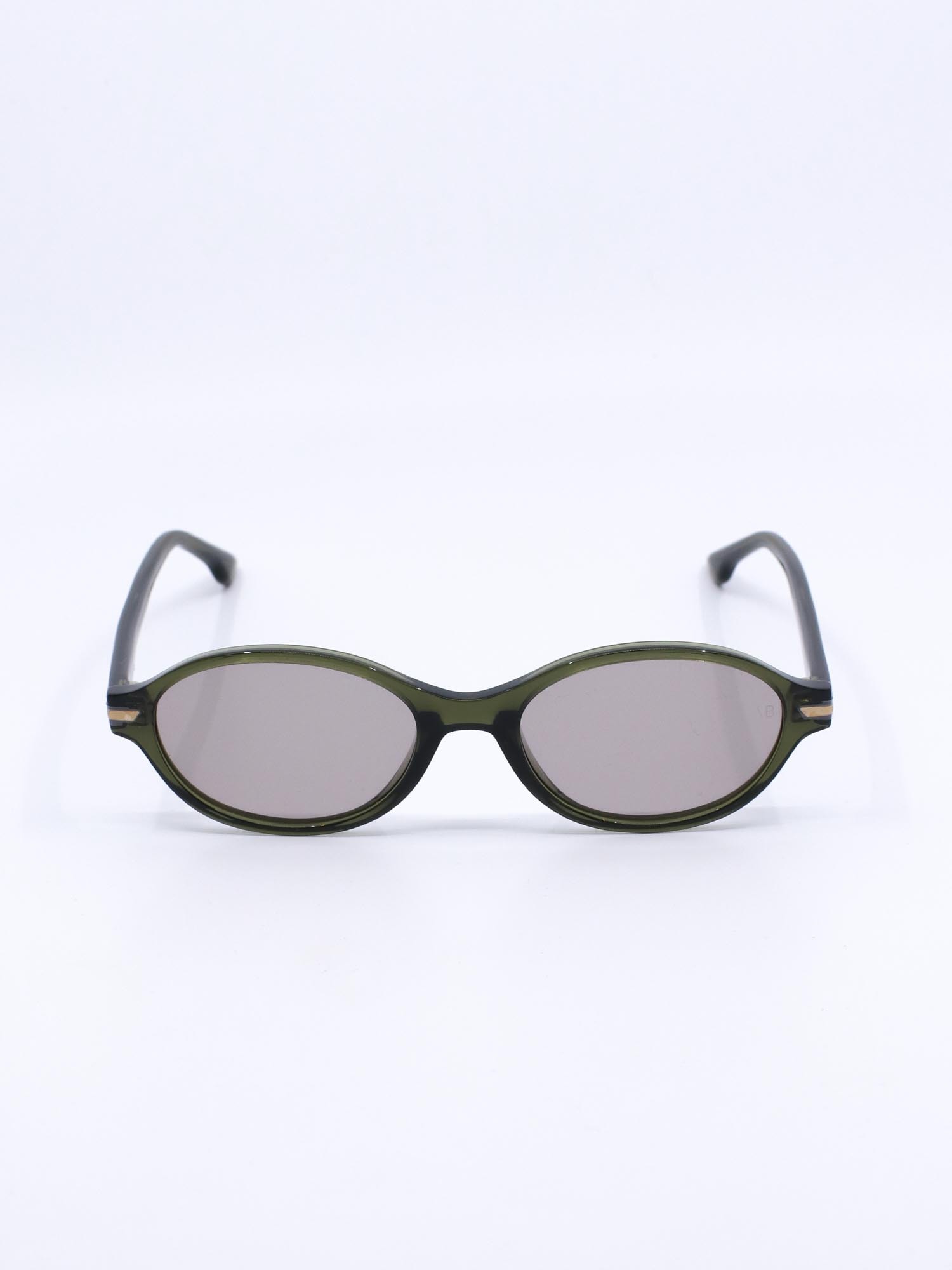 Oval solbrille med grønn ramme og lyse glass