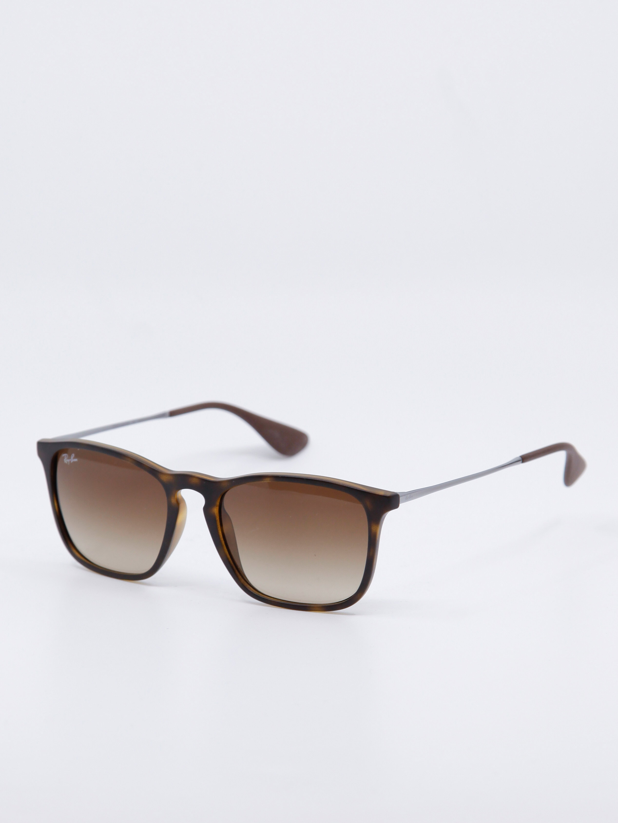 Brun og rund solbrille med brungraderte glass, bilde fra siden